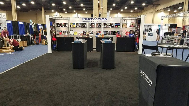 20x20 custom innovation line lots of bang for the buck this exhibit features ample product storage with graphics