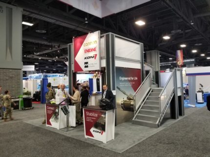 Stairs In Unique Two Story Trade Show Design In Las Vegas