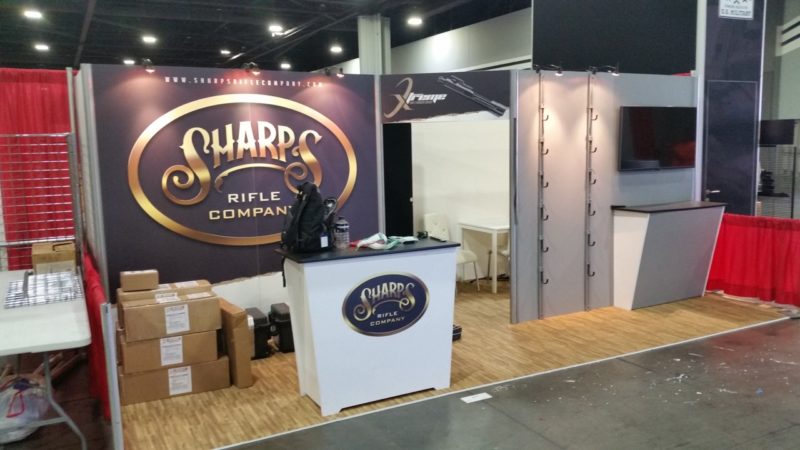 Storage and meeting space in a trade show booth design